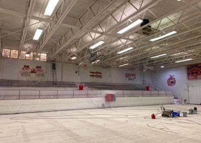 Prepping a large school gym for interior painting